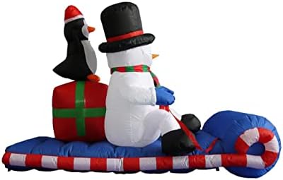 שני קישוטי מסיבות לחג המולד צרור, כולל פינגווין שלג מתנפח באורך 6 רגל, פינגווין על מזחלת, וגובה 6 מטרים